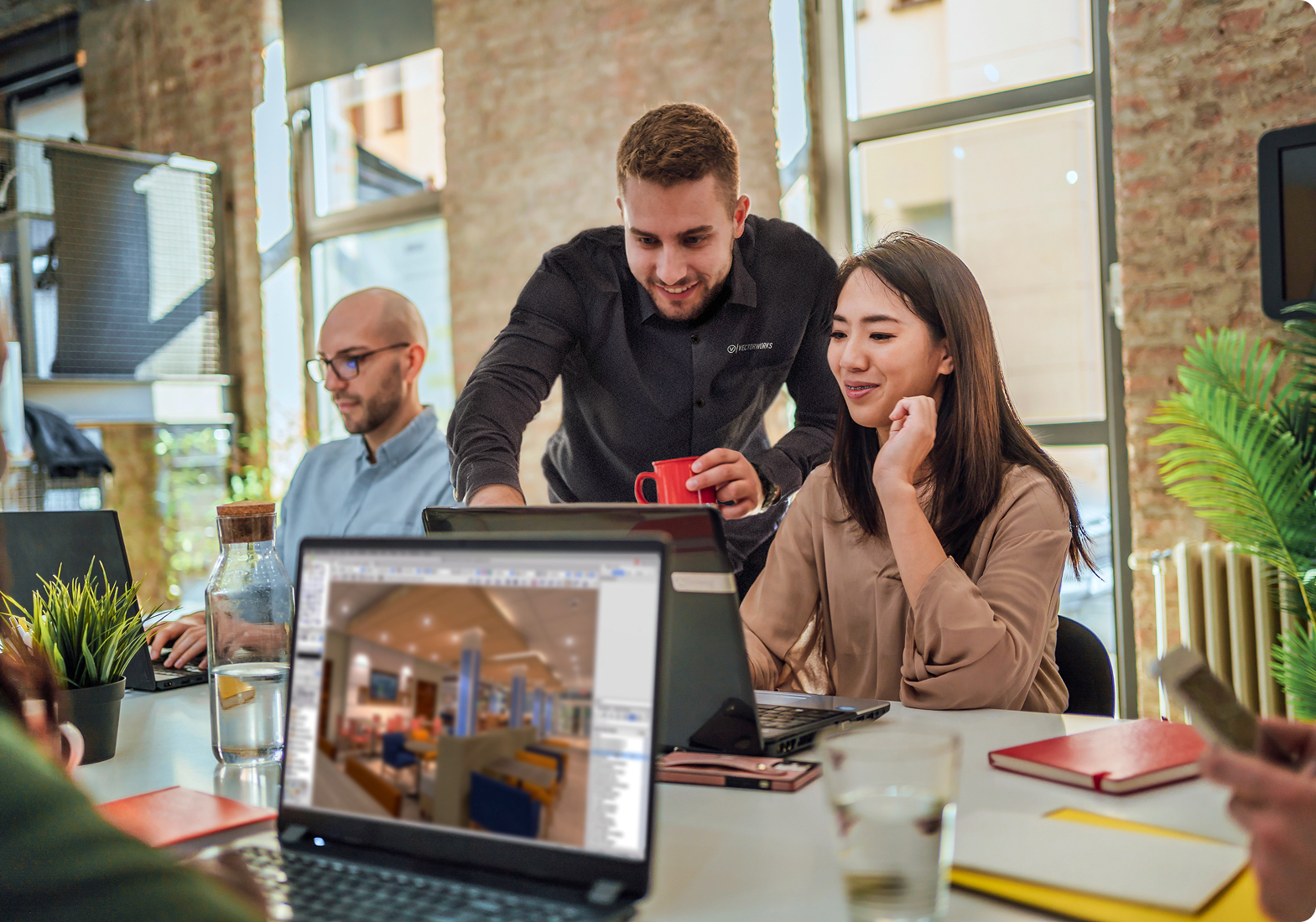 A group of young professionals collaborating in a modern office